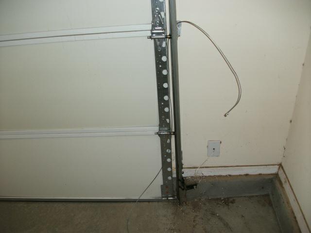 broken-garage-door-cable-3